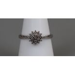 White gold diamond cluster ring, size M½