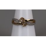 Gold & diamond set knot ring, size M½