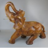 Carved hardwood elephant with glass tusks - Approx H: 62cm