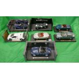Collection of 7 1/18 scale diecast model cars