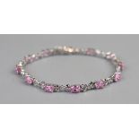 White gold pink topaz & diamond bracelet