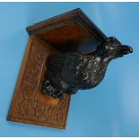 Early carved Black Forest bird figure mounted on later bracket - Approx H: 42cm