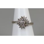 18ct white gold diamond cluster ring, size J