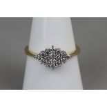 18ct gold diamond cluster ring, size Q½