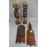 4 tribal carvings to include fertility figures
