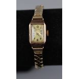 Watch with hallmarked gold back by Audax