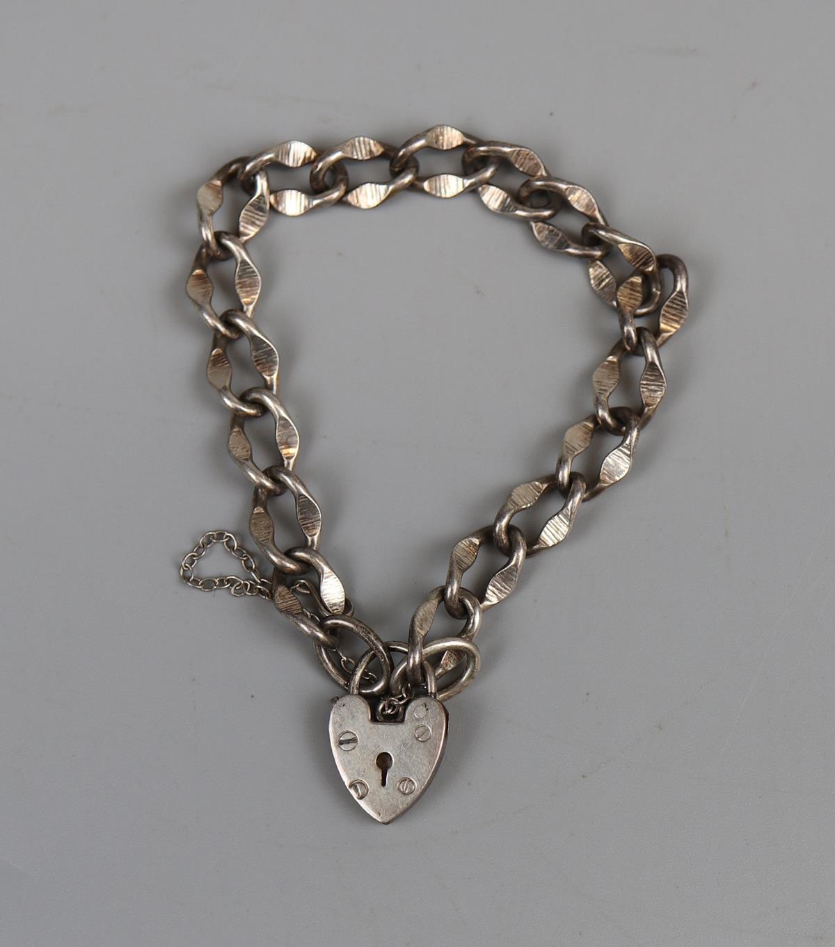 Silver locking heart bracelet