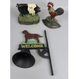 Cast iron door stop of saddle pig, cast iron door stop of cockerel & cast iron welcome bell
