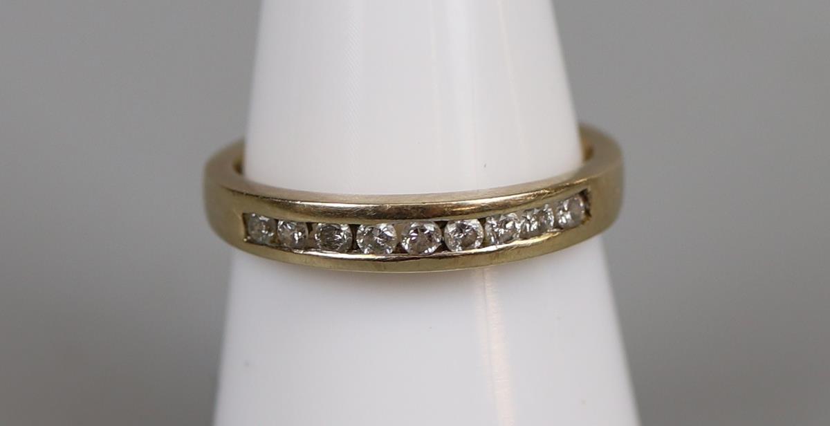 Gold channel set diamond ring - Size N