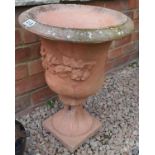 Terracotta pedestal planter