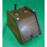 Antique coal scuttle with shovel