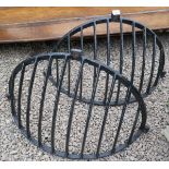 Pair of cast iron hay feeders