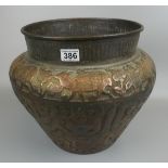 Large copper planter depicting wildlife