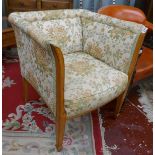 Square tub chair with floral pattern upholstery