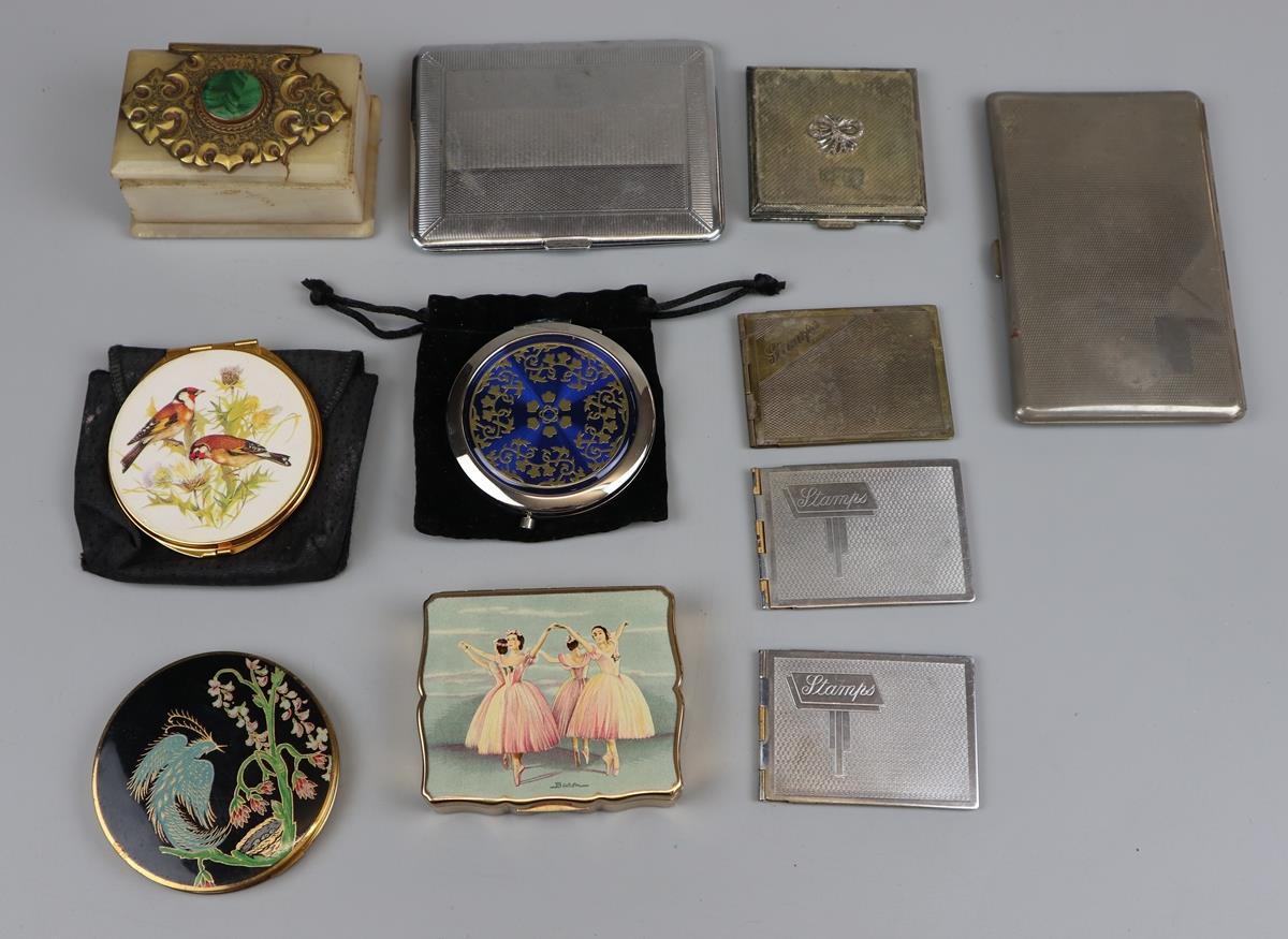 Collection of powder compacts and stamp holders