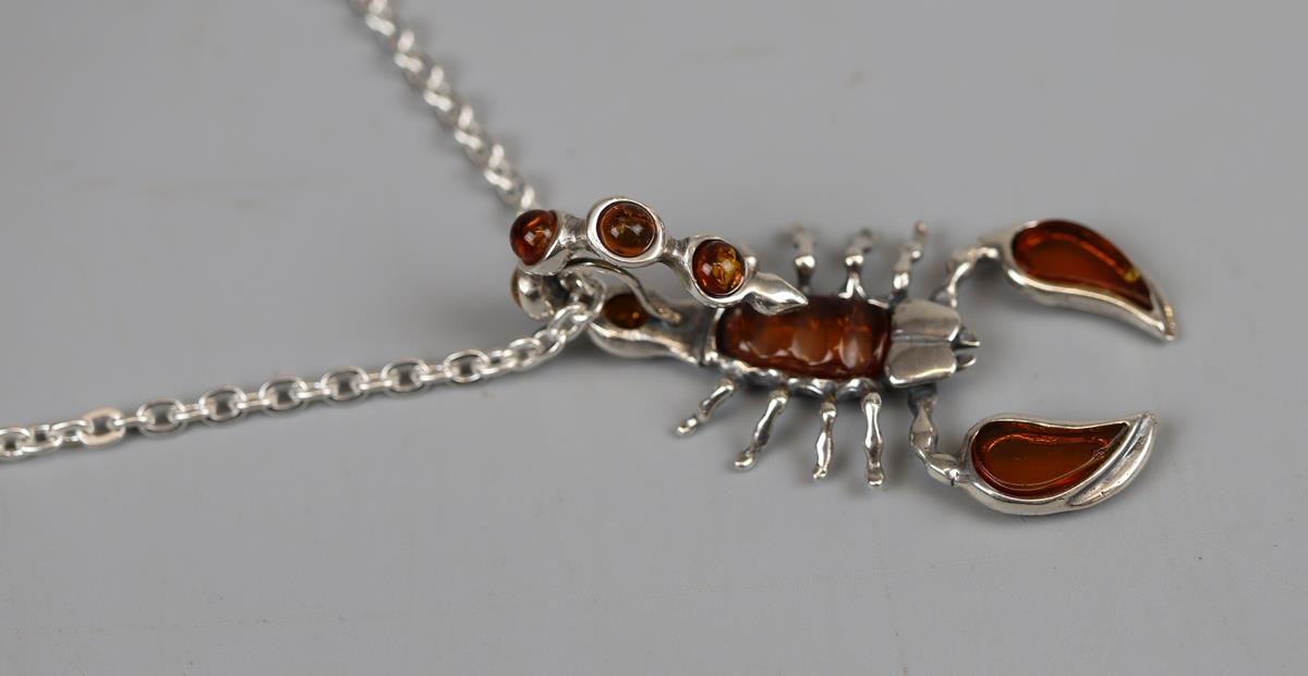 Silver & amber scorpion pendant on chain