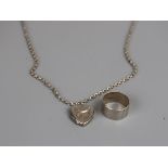 Silver locket on chain & silver ring