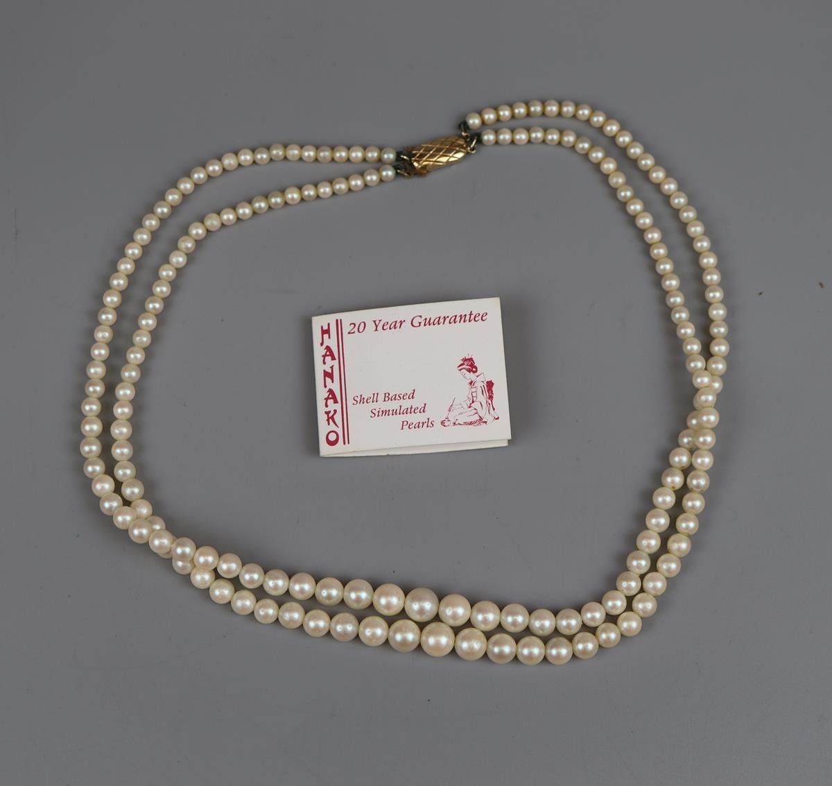 Simulated pearl necklace by Hanako with gold clasp
