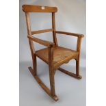 Childs oak rocking chair