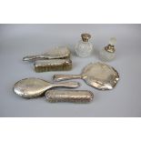 Collection of hallmarked silver dressing table brushes, bottles etc
