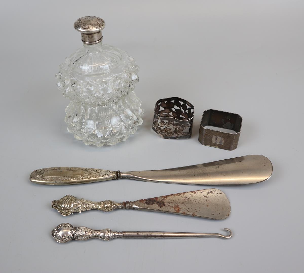 Collection of hallmarked silver to include silver topped perfume bottle