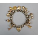 Gold plated charm bracelet with gold charms