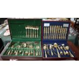 2 cases of gold tone cutlery