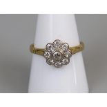 18ct gold diamond set daisy ring (size P½)