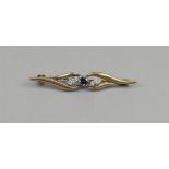 Gold brooch set with diamond & sapphire