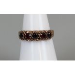 Gold garnet set ring (sizeJ)