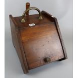 Antique coal scuttle with shovel