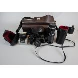Pentax camera in case with accessories