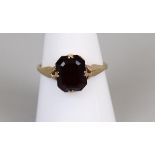 Gold garnet set ring (size P)