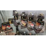 Collection of 9 Minichamps 1:8 scale model AVG Valentino Rossi helmets