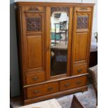 Satin walnut wardrobe with interesting carved panels - Approx size W: 151cm D: 51cm H: 198cm