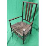 Antique rush seated armchair