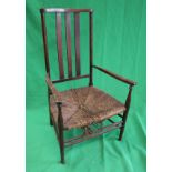 Antique rush seated armchair