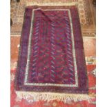 Red patterned rug - Approx 170cm x 103cm
