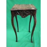 Carved oak occasional table