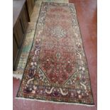 Red patterned runner - Approx 306cm x 113cm