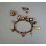 Gold charm bracelet - Total gross weight: 33.8g
