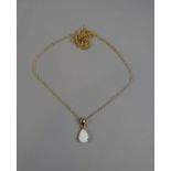 Gold opal pendant on gold chain