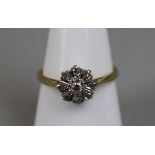 18ct gold diamond cluster ring (size R½)
