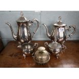 Silver plate tea & coffee service together with a brass bell