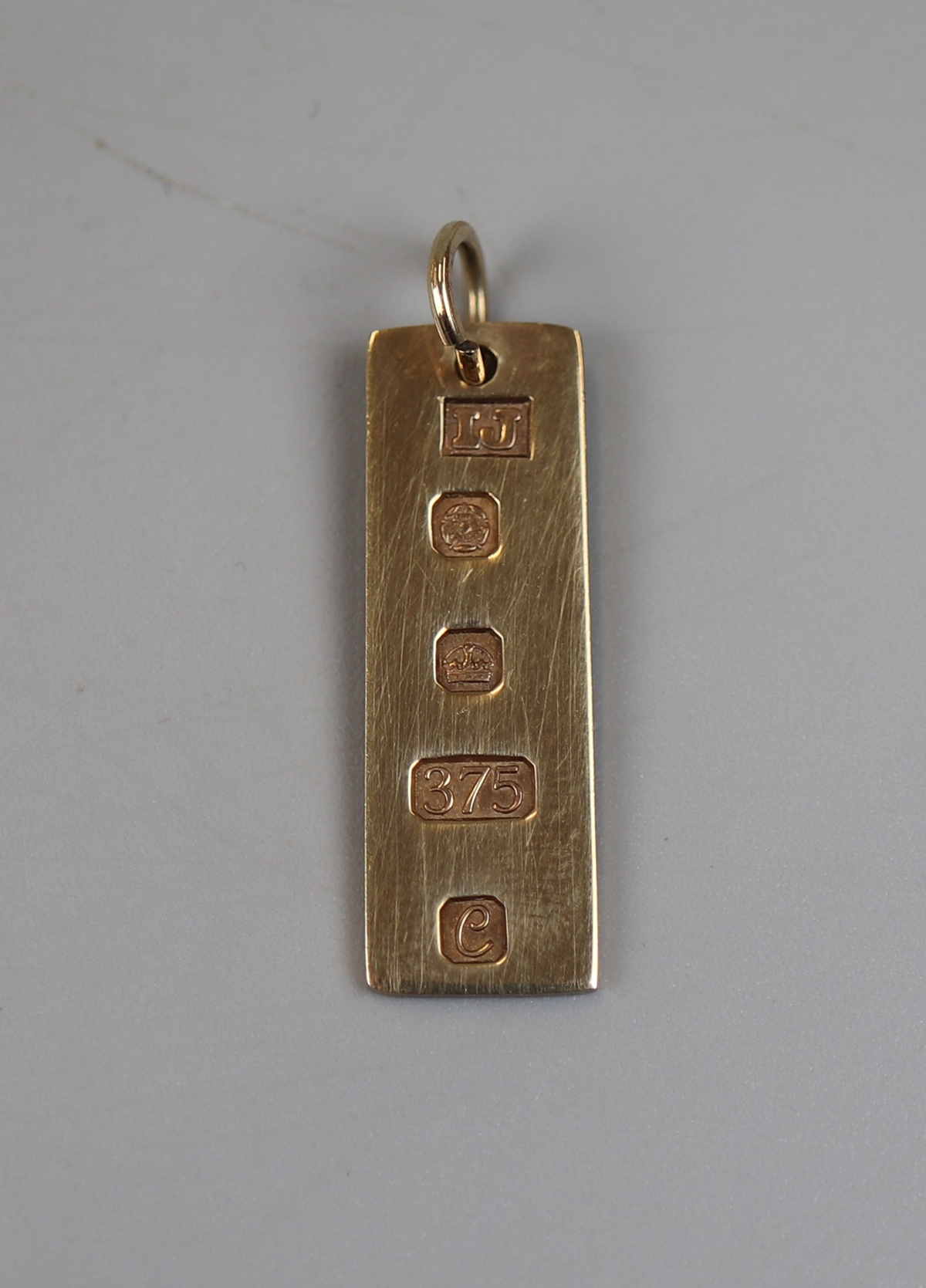 Gold ingot hallmarked for 1977 - Approx weight: 3.5g