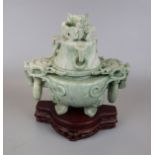 Decorative soap stone Oriental lidded urn on stand - Approx H: 27cm