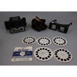 2 vintage view finders with slides