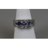 18ct white gold tanzanite & diamond set ring (size P)