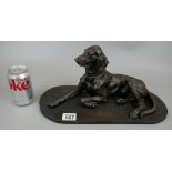 Bronzed dog figure on wooden plinth - Approx. L: 42cm