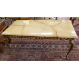 Marble top coffee table with ornate brass frame